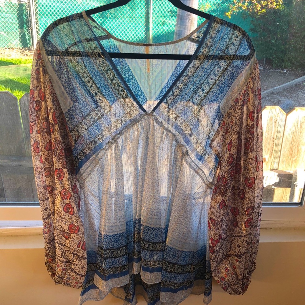 Free People flowy floral blouse.